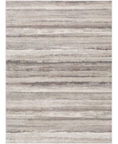 an area rug with grey and white stripes