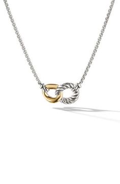 A link-by-link–handcrafted curb chain frames the interlocking, organically shaped rings pendant on this sterling silver necklace accented with 18-karat gold. 16" length; 1" extender; 3/4"W pendant Lobster clasp closure Sterling silver/18k gold Imported Yurman Necklace, David Yurman Necklace, Gift Inspo, Curb Chain, Link Necklace, David Yurman, Sterling Silver Necklace, Christmas List, Sterling Silver Necklaces