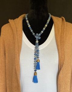 Blue Aventurine and Dumortierite hand-knotted tassel necklace. This necklace is actually one long strand when untied. You can adjust how close to the neck you would like it to be. It has blue Suede tassels held together with a metal bindings. Blue Aventurine, Suede Tassel, Blue Suede, Chain Styles, Tassel Necklace, Hippie Boho, Necklace Etsy, Hand Knotted, Tassels