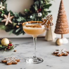 a drink with ginger cookies on the side