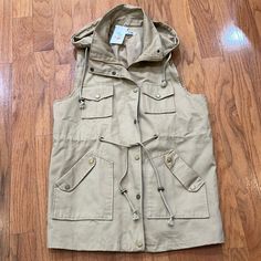 A Nwt Khaki Sleeveless Jacket With Removable Hood Size Xl Hood Zips Off Jacket Snaps & Zips Military Utility Vest ****See Photos For Best Description And Approximate Measurements Gnth0820234 Beige Vest With Pockets For Fall, Casual Beige Vest With Pockets, Khaki Outdoor Vest For Fall, Spring Khaki Vest Outerwear, Utility Style Khaki Vest Outerwear, Khaki Sleeveless Outerwear For Spring, Sleeveless Khaki Outerwear For Spring, Casual Khaki Sleeveless Outerwear, Casual Sleeveless Khaki Outerwear