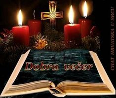 an open book with lit candles in the background and text dobra vecer