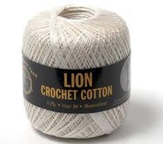 lion crochet cotton yarn in white and black on a white background with gold lettering