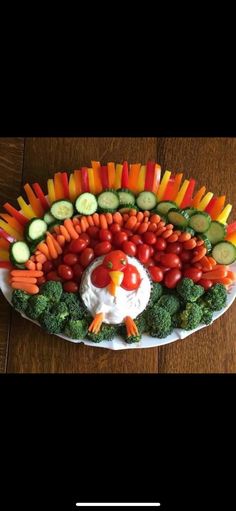 a turkey made out of vegetables on a platter