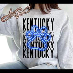 This will quickly become your favorite Kentucky Sweatshirt . Super soft sweatshirt that you can wear all season long. I always advise ordering your normal tee size. If in between sizes, size up for a looser fit or down for a more fitted appearance. Unisex and true to size. Sweatshirt is Ash Grey Items usually ship within 5-7 business days but keep in mind of weekends and holidays.  Please feel free to message us with any questions or requests, thank you for stopping by AltdGreyCO Kentucky Sweatshirt, Kentucky Wildcats, March Madness, Long I, Ash Grey, Print Shirt, Wild Cats, Keep In Mind, Paw Print