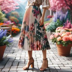 Dive into spring with effortless grace! 🌸 Embrace the season's charm in a floral blouse delicately tucked into a pleated midi skirt. Elevate your style with chic block heels for a touch of sophistication. 💐 Let your femininity bloom with this polished ensemble! Pleated Midi Skirt, Floral Blouse, Block Heels