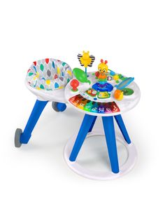 a child's activity table and chair with toys on the top, sitting in front of a white background