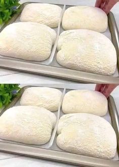 two pans filled with uncooked bread on top of a counter