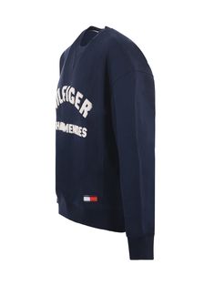 Tommy Hilfiger sweatshirt in dark blue cotton blend. Ribbed crewneck. Long sleeve. Ribbed cuffs and bottom. Front logo in sponge. Oversized fit. 58% viscose, 42% cottonComposition: Misto Cotone Burberry Shop, Tommy Hilfiger Sweatshirt, Classic American Style, Versace Shop, Officine Creative, Engineered Garments, Classic American, Lace Boots, American Style