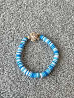 "New \"Ocean turtle!\" bracelet, this is perfect as we start to get into the sunny weather ☀️🌊 also a perfect gift for a friend or loved one, or even a little treat for yourself! <3 This is a preppy clay bead bracelet with blue and white clay beads with a turtle charm, good for adults and children alike. Good for: Mother's Day  Bracelet Birthday Bracelet For Teenager  Bracelet For Children  Mom Bracelet Friendship Bracelet Handmade with love. ❤️" Hawaii Clay Bead Bracelets, Adjustable Blue Jewelry For Vacation, Beaded Bangle Bracelets For Beach, Adjustable Blue Friendship Bracelets For Vacation, Hand-strung Beaded Bangle Bracelets For Beach, Hand-strung Bangle Stretch Bracelet For Beach, Hand-strung Beaded Bangle For Beach, Ocean-inspired Bracelets With Round Beads For Vacation, Blue Friendship Bracelets With Colorful Beads For Beach