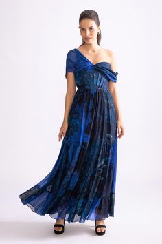 Blue tiered dress with daisy print and overlap draped sleeve. - Aza Fashions Off Shoulder Sleeves, Tuxedo Accessories, Gown Skirt, Drape Sleeves, Sharara Set, Daisy Print, Modern Dress, Tiered Dress, Dress For Women