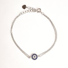 ♢ STYLE Subtle Zirconia Greek evil eye bracelet crafted from 925 Sterling Silver. Instantly brings a luxe touch to your everyday casual style. ♢ FEATURES & MATERIALS  :: Made of 925 Sterling Silver :: Blue and White Cubic Zirconia :: Double Chain made of 925 Sterling Silver :: Spring ring clasp made of 925 Sterling Silver ♢ SIZE & FIT :: Bracelet length adjustable from 15cm ( 5.9" ) to 18cm (7") :: The evil eye diameter is 7 mm(0.27") ♢ DELIVERY  :: This jewellery is shipped via the internationa Elegant Sterling Silver Evil Eye Bracelet, Sterling Silver Evil Eye Bracelet With Adjustable Chain, Silver Cubic Zirconia Evil Eye Bracelet Gift, Sterling Silver Evil Eye Bracelet In Silver, Silver Evil Eye Bracelets In Sterling Silver, Sterling Silver Evil Eye Bracelets, Elegant Silver Sterling Silver Evil Eye Bracelet, Elegant Silver Sterling Evil Eye Bracelet, Silver Evil Eye Chain Bracelet Gift