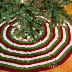 a christmas tree skirt is on the floor