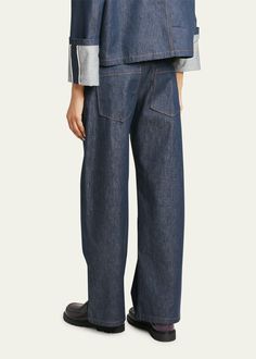 Find LOEWE Anagram Straight Leg Jeans on Editorialist. Loewe denim pants with Anagram knee detail Full length Mid rise sits high on hip Side slip pockets; back patch pockets Straight legs Button/zip fly; belt loops Cotton/polyester Dry clean Made in Italy Denim Blue Flare Jeans With Patch Pockets For Work, Modern Wide Leg Jeans With Patch Pockets, Modern Rigid Denim Workwear Bottoms, Rigid Denim Workwear Bottoms With Straight Hem, Straight Hem Rigid Denim Workwear Pants, Modern Dark Wash Pants With Pockets, Wide Leg Rigid Denim Pants With Side Pockets, Tapered Leg Rigid Denim Pants With Patch Pockets, Wide Leg Rigid Denim Bottoms With Patch Pockets