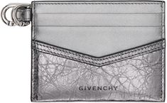 Crinkled calfskin card holder in silver tone. · Logo embossed at face · D-ring hardware at side · Six card slots · Central note slot · Grained calfskin lining · Silver-tone hardware · H3 x W4 Supplier color: Silvery grey Classic Silver Card Holder For Formal Occasions, Silver Classic Card Holder For Formal Occasions, Elegant Silver Card Holder For Formal Occasions, Designer Silver Wallet With Card Slots, Elegant Silver Card Holder With Card Slots, Classic Silver Card Holder With Card Slots, Luxury Formal Wallet On Chain With Silver-tone Hardware, Luxury Modern Wallets With Silver-tone Logo, Luxury Wallets With Silver-tone Hardware For Formal Occasions