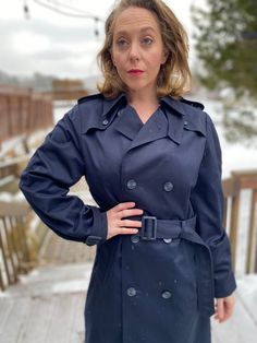 Vintage Navy Blue Classic Trench Coat by Pierre Cardin. Size is 38 T (Tall) Lovely designer trench coat, made well and has the original belt. Longer in the arms and length slightly. Fantastic vintage condition. Measured flat and in inches. Pit to pit - 20 in Waist - 20 in Hips - 22 in Sleeve - 26 in Length shoulder to hem - 46 in Classic Long Sleeve Raincoat For Work, Fitted Winter Workwear Raincoat, Fitted Raincoat For Winter Workwear, Fitted Winter Raincoat For Work, Navy Blue Trench Coat, Clothing Minimalist, Minimalist Jacket, Trench Coat Vintage, Coat Classic