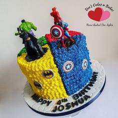 a birthday cake made to look like the avengerss and captain america characters on top