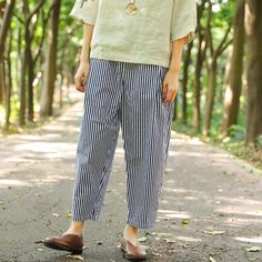 Main Material: CottonClothing Detail: Stripe,PocketsStyle: CasualWaist: Elastic WaistSeason: Spring,AutumnMain Color: Blue And WhiteLabel Size XXL(Fit for EU 42-44,US12-14,UK16-18,AU16-18,NZ16-18)Length: 88.00 cm/ 34.65 "Waist: 78.00 cm-96.00 cm/ 30.71 "-37.80 "Hips: 122.00 cm/ 48.03 "Leg Opening: 36.00 cm/ 14.17 "Leg: 74.00 cm/ 29.13 "Front Crotch: 33.00 cm/ 12.99 "Back Crotch: 35.00 cm/ 13.78 "The model height:165cm,weight:48kg,bust:82cm,waist:66cm,hips:87cmusually wear US Middle sizePS:1.The Non-stretch Striped Pants With Pockets, Casual Striped Pants With Welt Pockets, Casual Striped Bottoms With Welt Pockets, Striped Bottoms With Side Pockets For Spring, Striped Bottoms With Welt Pockets For Summer, Casual Striped Pants With Side Pockets, Spring Striped Bottoms With Pockets, Striped Spring Bottoms With Pockets, Baggy Striped Pants With Pockets