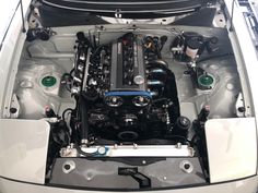 the engine compartment of a car is shown