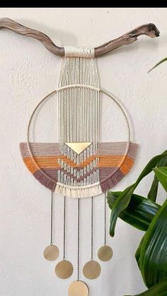 a wall hanging made out of metal and wood