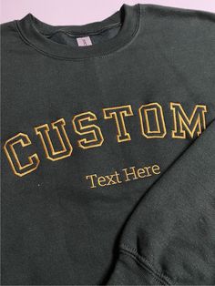 * Your custom text embroidered on super soft and comfortable 50/50 cotton/poly sweatshirt. * Sizes are in Unisex/Men's sizing and runs normal. * Size charts shows the sweatshirt measurement when it is laid flat. Black Collegiate Sweatshirt With Embroidered Logo, Sporty Crew Neck Sweatshirt With Custom Embroidery, Varsity Black Sweatshirt With Embroidered Logo, Black College Sweatshirt With Embroidered Text, Black Cotton Sweater With Letter Embroidery, College Crew Sweatshirt With Embroidered Logo, Varsity Crew Sweatshirt With Embroidered Text, Varsity Sweatshirt With Embroidered Text For Streetwear, Streetwear Crew Sweatshirt With Custom Embroidery