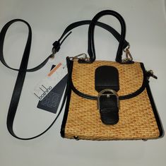 This Charming Crossbody Bag By Boshiho Features A Retro Straw Woven Design That's Perfect For Any Casual Or Formal Occasion. With A Small And Compact Size Of 4.3'' In Width, 7.9'' In Height And 9.4'' In Depth, It's Perfect For Carrying Your Essentials Without Weighing You Down. The Bag Comes With A Top Handle And An Adjustable Cross-Body Strap For Added Convenience.The Bag Is Made With A Combination Of Faux Leather, Pu Leather, And Straw, With Gold-Plated Hardware Accents. It Features A Variety Black Straw Bag With Detachable Strap For Vacation, Black Leather Straw Bag With Adjustable Strap, Casual Black Leather Straw Bag, Black Straw Travel Bag With Detachable Strap, Black Straw Bag With Detachable Strap For Travel, Black Straw Crossbody Bag With Detachable Strap, Black Straw Bag With Adjustable Strap For Everyday Use, Black Bag With Detachable Strap For Vacation, Black Shoulder Bag With Detachable Strap For Vacation