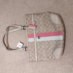 Nwt. Coach Chelsea Heritage F14477 Signature Shoulder Handbag. Light Khaki Color With White And Pink Stripe. Pink Stripe Isore Muted Than The Pictures Show. Light Pink Lining. Pink Satchel For Errands, Pink Satchel With Leather Handles For Errands, Pink Bags With Branded Hardware For Everyday Use, Pink Shoulder Bag With Branded Hardware For Errands, Everyday Pink Bags With Branded Hardware, Rectangular Pink Satchel With Branded Hardware, Pink Shoulder Bag With Branded Hardware For Daily Use, Pink Rectangular Satchel With Branded Hardware, Pink Coach Shoulder Bag For Errands