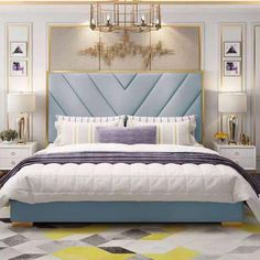 a bedroom with a blue headboard and yellow accents on the wall above the bed