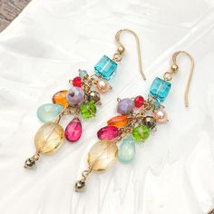 Loving the movement and playfulness of colors of these multi-gem earrings. Featuring Citrine dangle from cascade of gems. These are measuring 2.25”. Chocolate Jewelry, Gem Earrings, Citrine Earrings, The Movement, Sterling Earrings, Pandora Charm Bracelet, Gold Vermeil, Citrine, Sterling Silver Jewelry