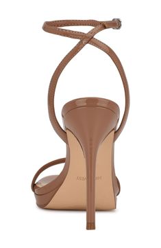 Make a striking statement in this open-toe ankle-strap sandal lifted with a subtle platform and sky-high stiletto heel. 4 1/4" heel; 1/2" platform Synthetic and textile upper and lining/synthetic sole Imported Fitted Platform Open Toe Sandals, Fitted Open Toe Slingback Sandals With Padded Heel, Fitted Open Toe Platform Heels, Platform Slingback Sandals With Ankle Strap For Evening, Fitted Slingback Sandals With 4-inch Heel, Platform Synthetic Sandals, Synthetic Platform Sandals, Fitted Platform Sandals, Evening Platform Slingback Sandals In Synthetic