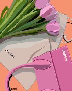 a pink purse and some flowers on a table