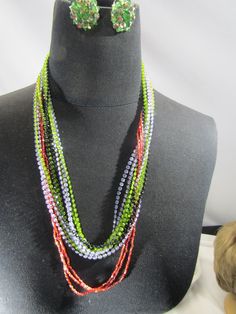 "the necklace is 48\" long and clip earrings are 1' long" Red Beaded Necklace, Cute Bras, Beaded Necklaces, Clip Earrings, Steel Chain, Chain Styles, Green And Purple, Clip On Earrings, Vintage Dresses