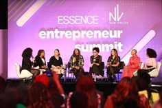 four women sitting on chairs in front of a purple screen with the words experience and new voice