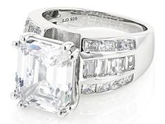 Bella Luce® white diamond simulant 12.70ctw rectangle, baguette, and square, platinum over sterling silver ring. Measures approximately 0.94" L x 0.44" W and is not sizable. Diamond equivalent weight is 7.69ctw. Classic Baguette Diamonds Square Cut Jewelry, Luxury Rectangular Channel Set Jewelry, Luxury White Rectangular Jewelry, Silver Emerald-cut Baguette Diamond Jewelry, Silver Emerald Cut Baguette Diamond Jewelry, Silver Baguette Diamond Jewelry With Emerald Cut, Silver Square Cut Baguette Diamond Ring, Classic Jewelry With Baguette Diamonds In Rectangular Shape, Silver Jewelry With Emerald Cut Baguette Diamonds