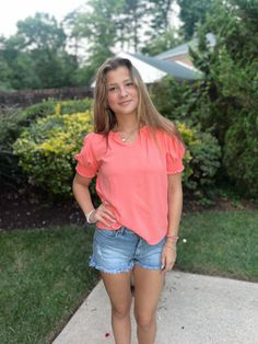 Coral, Solid Top, Ruffled V-Neck, Smocked Sleeves Trendy V-neck Top With Smocked Back, Chic V-neck Smocked Top For Day Out, Casual V-neck Top With Short Sleeves For Brunch, V-neck Smocked Top For Day Out, Feminine V-neck Smocked Top For Day Out, Casual V-neck Top For Spring, Feminine V-neck Smocked Top For Summer, Summer Feminine V-neck Smocked Top, Spring Brunch V-neck Smocked Top