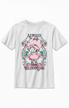 Online Only! Enjoy some sweet style brought to you by the adorable Kids Always Blooming Strawberry Shortcake T-Shirt. This tee has a crew neckline, short sleeves, a standard fit, and retro graphics printed on the front.


	Crew neckline
	Short sleeves
	Standard fit
	Front graphic
	100% Cotton
	Machine washable Cute Crew Neck T-shirt, Sweet Pink T-shirt With Cartoon Print, Kawaii Crew Neck Pre-shrunk T-shirt, Sweet Style T-shirt With Funny Print For Spring, Sweet White Short Sleeve T-shirt, White Sweet T-shirt With Funny Print, Sweet White T-shirt With Funny Print, Cute Funny Print T-shirt, Sweet White T-shirt With Graphic Print