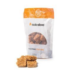 a bag of solestove with some kind of food next to it on a white background