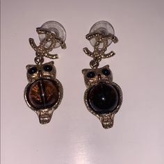 Authentic Chanel Gold And Black Owl Earrings. Comes With Original Box. Warn A Few Times. Looks Brand New. No Scratches Black Owl, Owl Earrings, Chanel Jewelry, Earrings Color, Owls, Original Box, Jewelry Earrings, Chanel, Women Jewelry