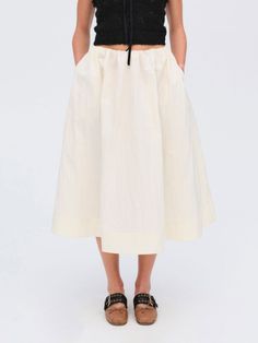 An ultra-chic transitional piece, the Billie cream midi skirt is crafted in a crisp, crinkle stretch poplin flares out into a full gathered skirt. Pair it with a contrasting colored top for a chic, seasonal look. Chic Cream Ruffled Maxi Skirt, Chic Cream Ruffled Skirt, Chic Spring Gathered Maxi Skirt, Chic Gathered Spring Maxi Skirt, Chic Cream Maxi Skirt With Ruffles, Chic Gathered Maxi Skirt For Spring, Chic Midi-length Cotton Maxi Skirt, Spring Daywear Pleated Tiered Skirt, Chic Cotton Maxi Skirt Midi Length