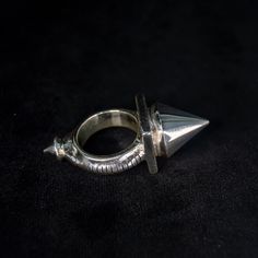 Here is one very nice Tuareg spike ring, it also looks great as a gothic ring, which ever style you prefer it is a great  gift or for any occasion. This boho style piece of jewelry looks excellent on any gender's hand, so treat yourself or a loved one to a very unique item. I also offer custom wooden ring boxes (see in listings in my shop) which would go well with this ring. This version is made out of silver, cast as a single piece of metal, so no glues or soldering, making it very sturdy and d Punk Style Metal Open Ring, Silver Punk Jewelry With Metal Ring, Silver Punk Style Metal Ring, Gothic Style Jewelry Metal Ring As Gift, Gothic Silver Metal Rings, Punk Style Silver Jewelry With Metal Ring, Punk Style Metal Open Ring Jewelry, Silver Gothic Rings In Metal, Gothic Metal Rings For Collectors