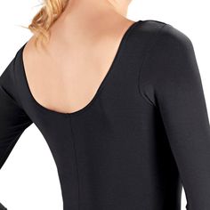 So Danca SL14/D7600 Adult Long-Sleeve Microfiber Leotard This So Danca Adult Long-Sleeve Microfiber Leotard features a Classic front and built-in shelf. The long sleeves will take your dancer away from the world of spaghetti strap leotards. Pair this leotard with some tights, and your dancer will be sure to stand out from the rest. Content: Microfiber Sizes: P, S, M, L, XL Care Instructions: Machine wash in cold water, hang dry. *Please note that So Danca USA prohibits the sale of So Danca produ Fitted Scoop Neck Bodysuit With Thumbholes, Fitted Bodysuit With Thumbholes And Scoop Neck, Solid Color Dance Unitard With Thumbholes, Solid Color Long Sleeve Elastane Leotard, Solid Long Sleeve Elastane Leotard, High Stretch Long Sleeve Elastane Leotard, Solid Color Dancewear Unitard With Thumbholes, Solid Dancewear Unitard With Thumbholes, Solid Unitard With Thumbholes For Dancewear