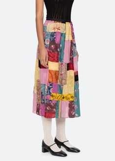 Hand crafted from vintage saris, the Phoebe patchwork skirt features an elasticized waist, and multi colored patchwork design throughout. Each garment is individually made with vintage saris, making each piece unique. No two are exactly alike. Details: 60% polyester, 40% viscose invisible side zipper style #AW24-131 model is 5'10'' and wearing a size S PRE-ORDER: EXPECTED DELIVERY 8/30-9/30 Phoebe Skirt, Sea Ny, Patchwork Skirt, Vintage Saris, Patchwork Designs, Engineered Garments, Kids Sleepwear, Thom Browne, Denim Shop