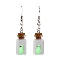 PRICES MAY VARY. Unique Design: These creative ghost-themed earrings feature a unique design with a ghost enclosed in a small bottle, the pendant is a mini glass bottle with a cute glowing little ghost in it, it will glow in the darkness when it is exposed to sunlight or violet light for 15 minutes, they are guarding your side as if you control them with magic, it's very funny and it will bring you good luck. Safe Material: Crafted from high-quality glass resin and alloy, the necklace is sturdy Cute Halloween Party Jewelry, Halloween Gift Drop Earrings, Halloween Gift Drop Earrings Jewelry, Green Halloween Party Earrings, Whimsical Halloween Jewelry Gift, Green Halloween Party Jewelry, Silver Glow In The Dark Jewelry For Party, Silver Glow-in-the-dark Jewelry For Party, Luminous White Jewelry For Party