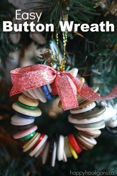 an ornament hanging from a christmas tree with the words easy button wreath