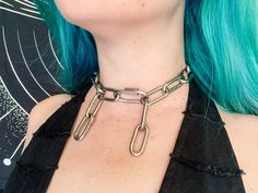 Back to the Basics: my Stainless Steel Chain Collection is an essential for every goth, punk, emo or metalhead's wardrobe. Stack it up, throw on some stompy boots, and you're all set to slay! 𝗣𝗿𝗼𝗱𝘂𝗰𝘁 𝗱𝗲𝘁𝗮𝗶𝗹𝘀: - 𝗖𝗼𝗹𝗼𝗿: stainless steel silver. - 𝗛𝗲𝗮𝘃𝘆 𝗗𝘂𝘁𝘆 𝗦𝘁𝗮𝗶𝗻𝗹𝗲𝘀𝘀 𝗦𝘁𝗲𝗲𝗹 𝗖𝗵𝗮𝗶𝗻: this piece of jewelry is not going to crap out on you. - 𝗔𝗱𝗷𝘂𝘀𝘁𝗮𝗯𝗹𝗲 𝗙𝗶𝘁: the stainless steel lobsters clasp offer adjustability allowing you to customize the fit Edgy Silver Choker For Cosplay, Alternative Metal Choker For Cosplay, Edgy Metal Choker For Cosplay, Grunge Choker For Cosplay, Alternative Style Silver Choker For Concert, Alternative Metal Choker For Concerts, Punk Chain Jewelry For Alternative Fashion, Punk Style Chain Jewelry For Alternative Fashion, Grunge Choker With Adjustable Chain