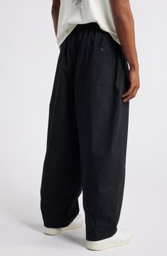 Volumize your look with these pleated and billowy balloon-leg pants that are made from cotton poplin and feature roomy pockets to further the theme. 28 1/2" inseam; 20" leg opening; 15 1/2" front rise; 18 1/2" back rise (size Medium) Elastic/drawstring waist with button closure Faux fly Side-seam pockets; back button-patch pockets 100% cotton Machine wash, tumble dry Imported Nike Cotton Bottoms With Elastic Waistband, Nike Relaxed Fit Cotton Pants, Nike Cotton Bottoms With Relaxed Fit, Nike Cotton Pants For Spring, Nike Relaxed Fit Bottoms With Elastic Waistband, Nike Relaxed Fit Bottoms, Nike Bottoms With Elastic Waistband And Relaxed Fit, Nike Cotton Bottoms With Pockets, Nike Cotton Cargo Pants For Streetwear