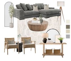 a living room with grey couches and pillows on the wall, coffee table, lamp, mirror, lampshade