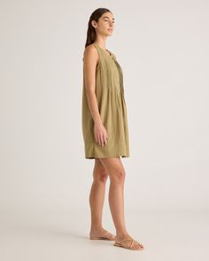 With an effortless look and flowy shape, our 100% Organic Cotton Gauze Sleeveless Swing Dress is a must-have for your warm-weather wardrobe. Made from soft, breathable organic cotton gauze, this sleeveless dress has a comfortably relaxed fit designed to keep you cool on even the hottest summer days. Bonus: it's got pockets!  | Quince | Women's Gauze Sleeveless Swing Dress in Artichoke, Size XS, Organic Cotton Unlined Sleeveless Dress For Daywear, Chic Sleeveless Dress With Relaxed Fit, Relaxed Fit Sleeveless Summer Dress, Casual Sleeveless Dress For Spring Daywear, Casual Sleeveless Sundress With Relaxed Fit, Casual Sleeveless Relaxed Fit Dress, Casual Unlined Sleeveless Dress For Daywear, Breezy Sleeveless Sundress For Daywear, Summer Sleeveless Sundress In Relaxed Fit