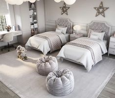 two beds in a bedroom with white walls and flooring, one is made up to look like it has stars on the ceiling