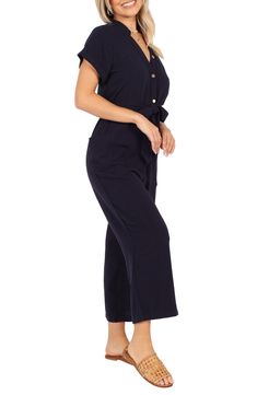 A defining tie tethers the waist of this lightweight linen jumpsuit designed with abbreviated sleeves and cropped legs. Front button closure V-neck Short sleeves Removable belt Side patch pockets 100% linen Hand wash, dry flat Imported Casual Belted V-neck Jumpsuits And Rompers, Cotton Jumpsuits And Rompers For Work With Tie Waist, Belted Cotton Jumpsuits And Rompers With Short Sleeves, Casual V-neck Belted Jumpsuits And Rompers, Spring Cotton Belted Jumpsuits And Rompers, Spring Linen Belted Jumpsuits And Rompers, Summer Linen Belted Jumpsuits And Rompers, Casual Cotton Belted Jumpsuits And Rompers, Chic Linen Jumpsuits And Rompers With Short Sleeves